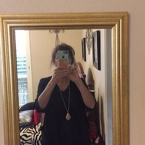 Short black cardigan with mess black of cardigan